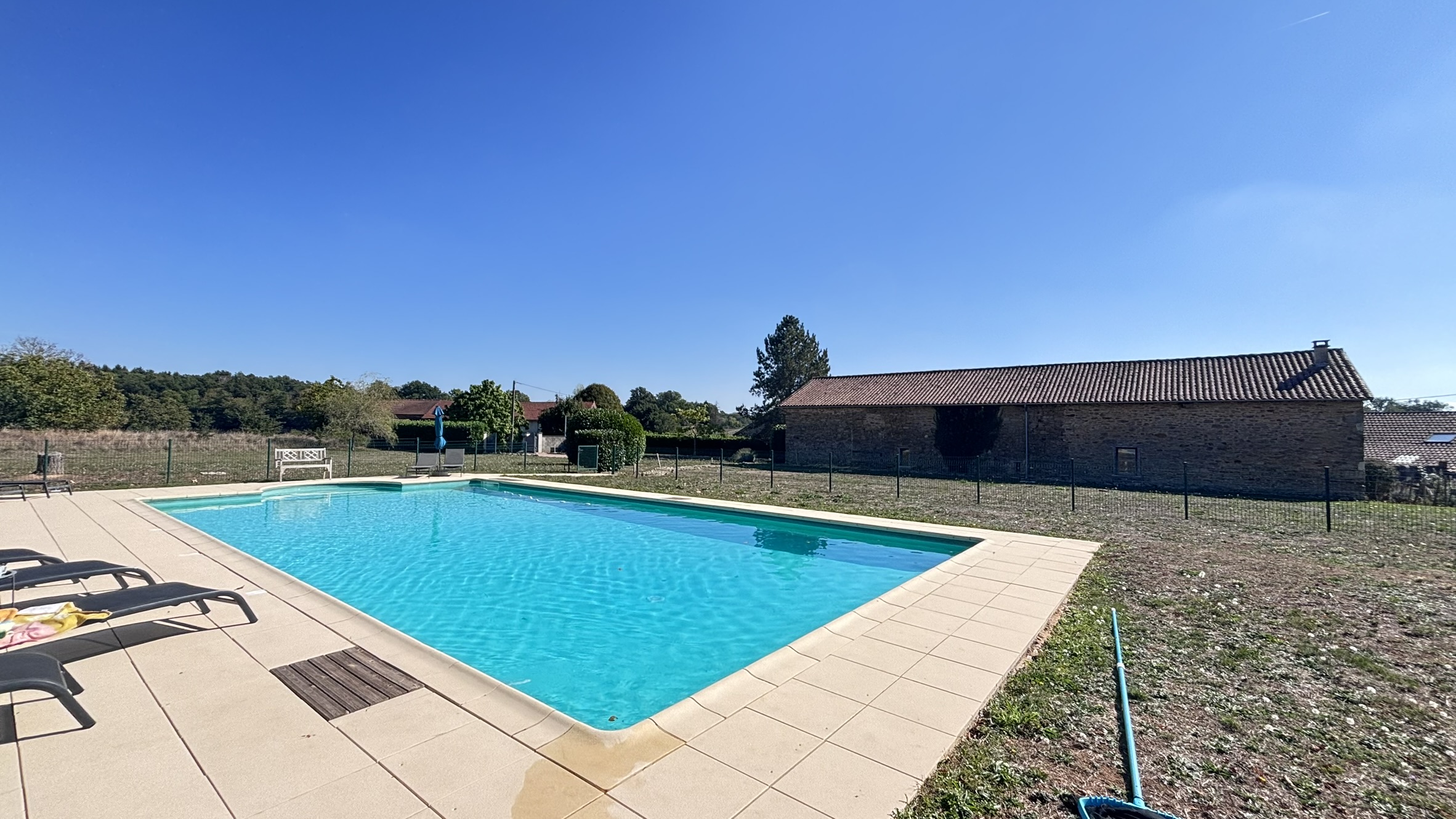Swimming pool beside the farmhouse